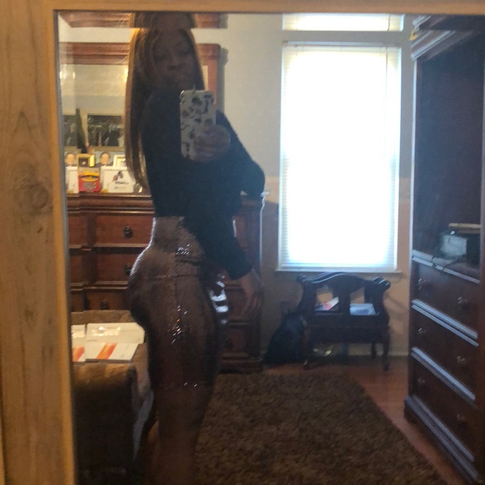 V-Style low cut black dress with mauve sequin